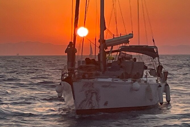 3.5 Hour Private Rhodes Sunset and Wine Sailing Tour - Sailing past the medieval walls of Rhodes Old Town