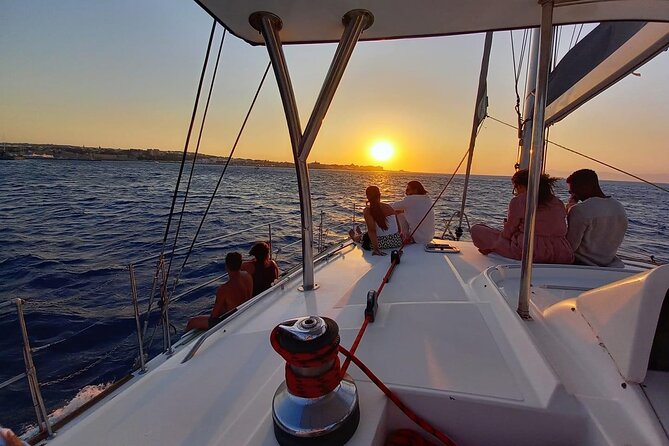 3-Hours Sunset Catamaran Cruise with Dinner all Inclusive - Leaving Mandraki Harbor in Rhodes