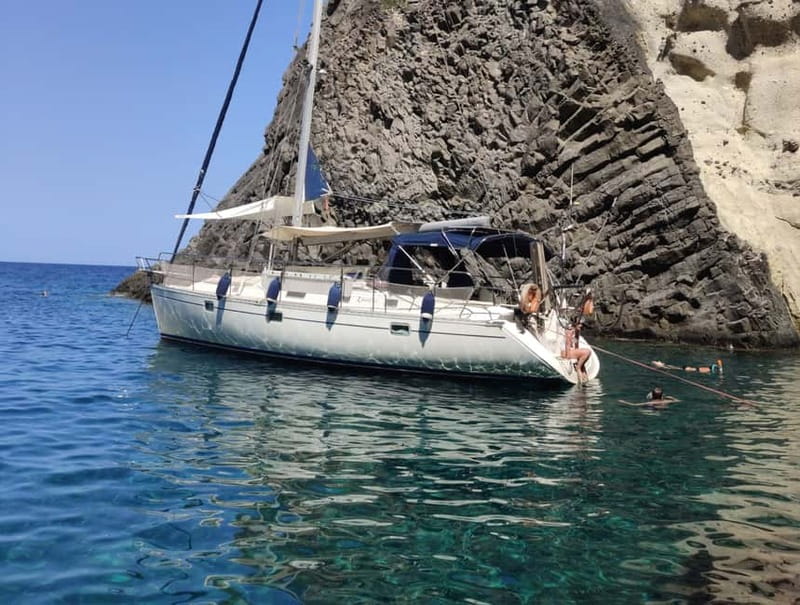 Adamantas: Kleftiko Sailing Cruise with Meal and Swim Stops - Arkoudes and the open water toward Cape Vani