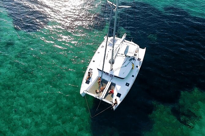 Athens Private Luxury Catamaran Cruise with Traditional Greek Meal and BBQ - The first swimming stop
