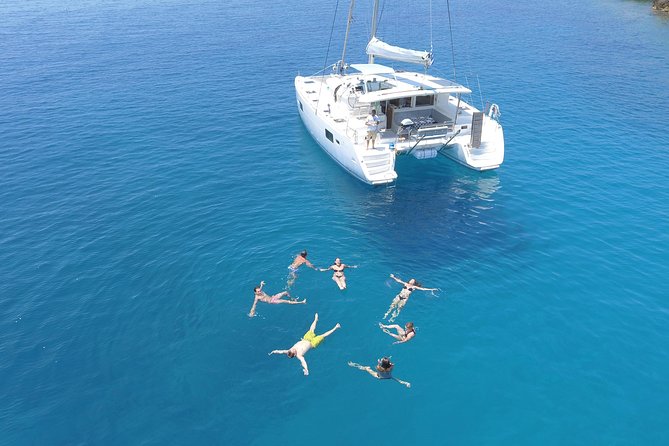 Athens Private Luxury Catamaran Cruise with Traditional Greek Meal and BBQ - Snorkeling, food, and the long middle stretch