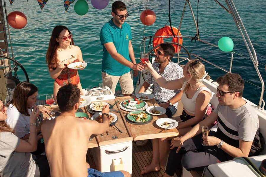 Athens: Semi Private Sunset Sailing and Gastronomy Cruise - The sunset over Vouliagmeni