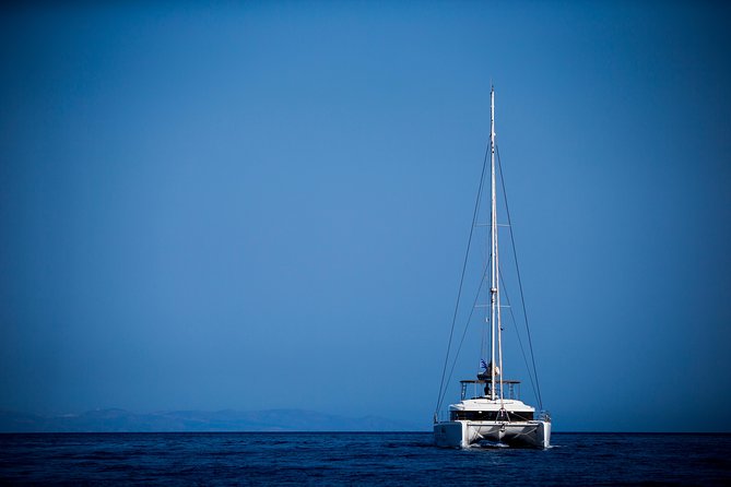 Beautiful Day Catamaran Caldera Cruise incl. Meal & Drinks - Mesa Pigadia, White Beach, and lunch on board
