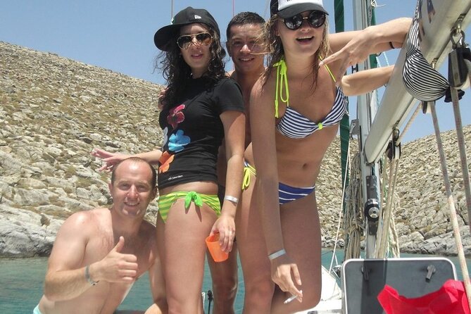 Catamaran cruise in Mykonos with Meal, Drinks & Transport - Returning past Little Venice and the windmills
