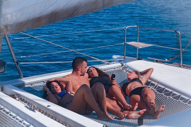Catamaran cruise in Mykonos with Meal, Drinks & Transport - Swimming and lunch in Rhenia