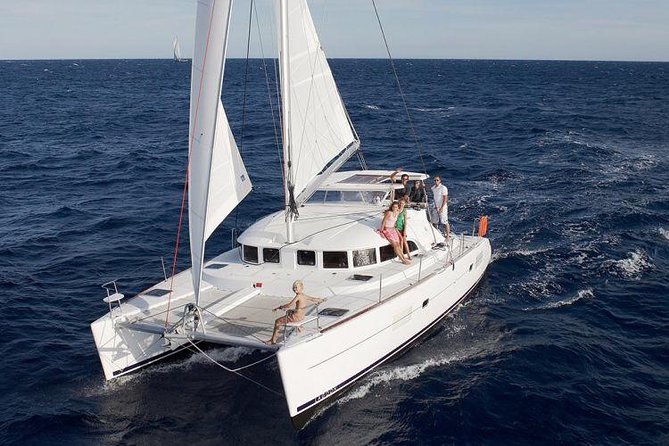 Catamaran Day & Sunset Cruises with meals Drinks and transportation - Delos from the water, not from the ruins