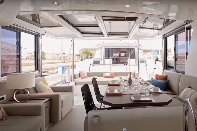 CATAMARAN Kleftiko Poliegos & Round of Milos Lunch with Openbar - Kleftiko: caves, cliffs, and the classic Milos view