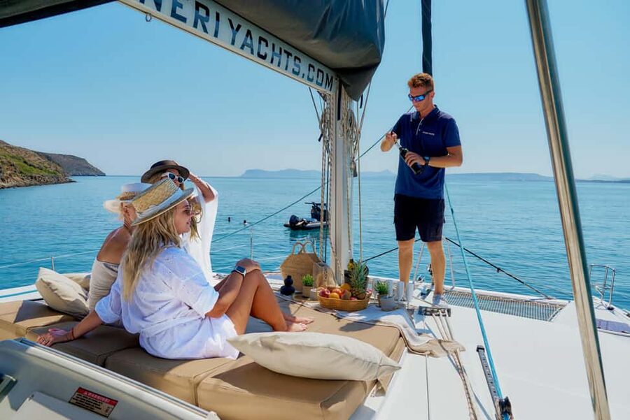 Chania Old Port: All-inclusive Catamaran Trip Agioi Theodori - Leaving Chania Old Port with breakfast on deck
