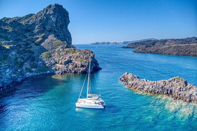 Deluxe Santorini Sailing with BBQ and Drinks Shared Tour - Red Beach and White Beach: a short swim stop