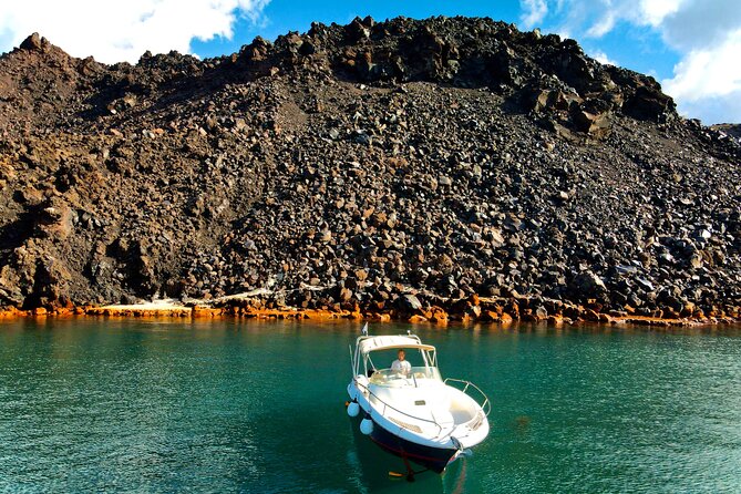 Explore Santorini and its volcanic wonders with Alex Private Boat - Palea Kameni and the hot-spring swim