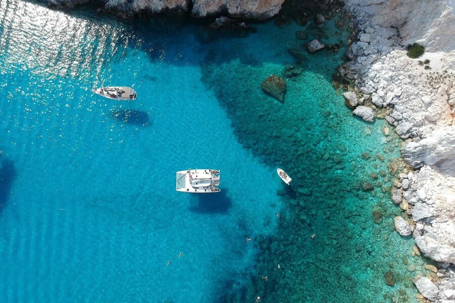 From Adamas: Milos and Poliegos Catamaran Cruise with Lunch - Galazia Nera, seagulls, and the ride home