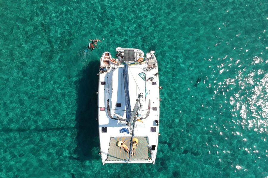 From Adamas: Milos and Poliegos Catamaran Cruise with Lunch - Gerakas, Tsigrado, and the southern coast