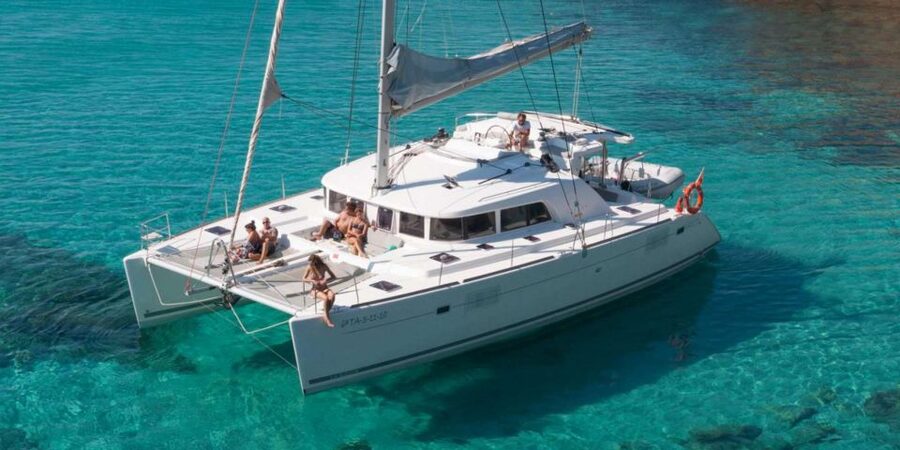 From Adamas: Milos and Poliegos Catamaran Cruise with Lunch - Sykia Cave and the volcanic coast