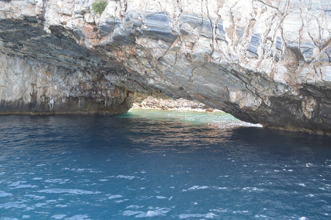 Full Day Catamaran Cruise in Paros - Simadoura’s rocky coast and sea caves