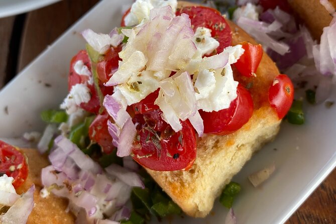 Greek Gastronomy & Wine Pairing Cruise with a Sommelier in Athens - Swimming and snorkeling in clear water