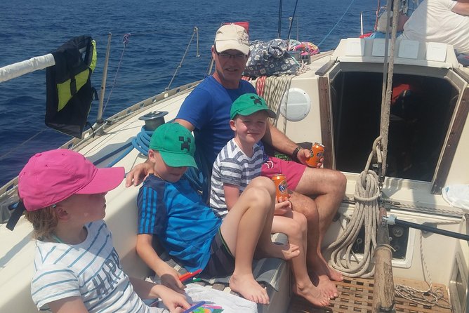 Greek Shores Snorkel and Sailing Day Trip with Lunch - Anthony Quinn Bay, clear water and lunch on deck