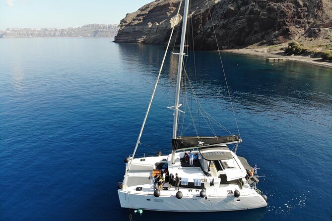 Half-Day Exclusive Catamaran Cruise in Santorini with Meal and Open Bar - Why seeing Santorini from the water matters