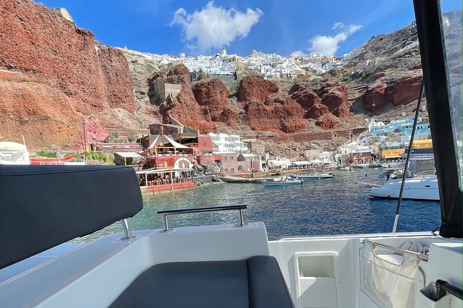 Half Day Premium Catamaran Cruise in Santorini including Oia - BBQ dinner and the open bar