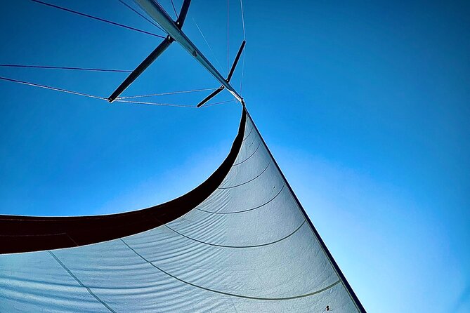 Half day Private Sailing cruise in Santorini island up to 6 pax - Mesa Pigadia: Black Beach and the Main Meal