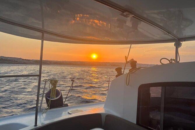 Half Day Sailing Catamaran with Sunset Experience - Weather, cancellation, and practical planning