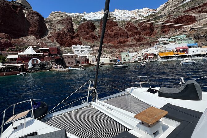 Half-Day Tailor-made Private Catamaran Cruise in Santorini - Red Beach and Santorini’s red cliffs