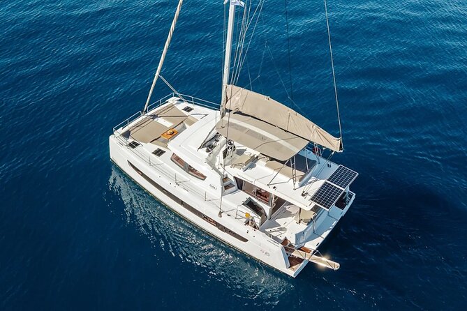 Hersonissos: Luxury Sunset Catamaran Cruise Sushi & Open Bar - Leaving Hersonissos with Prosecco in hand