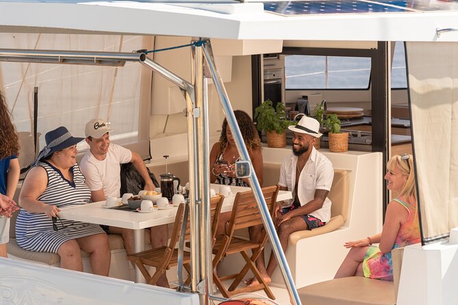 Hersonissos: Luxury Sunset Catamaran Cruise Sushi & Open Bar - Agios Georgios Sarantaris and Saint George Bay