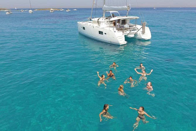 Luxury Catamaran Cruise from Athens with Traditional Greek Meal and BBQ - Sailing past Voula and Vouliagmeni
