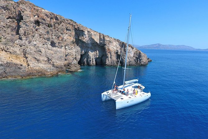 Luxury Catamaran Cruise Including pickup and Traditional Food - Two or three swimming stops in the blue water