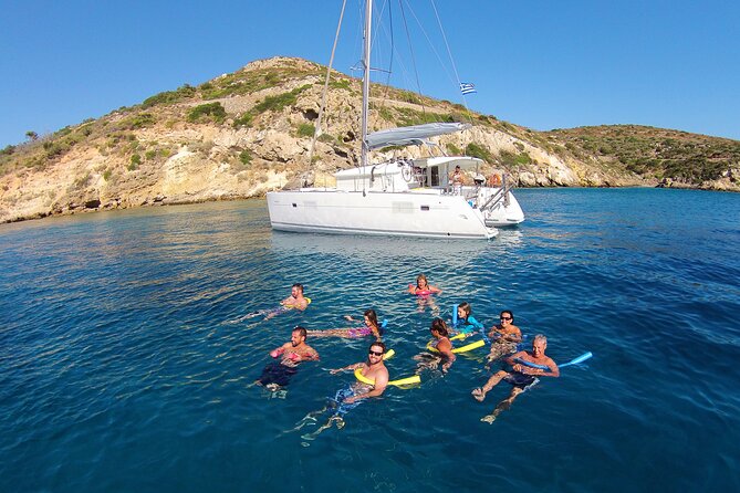 Luxury Catamaran Cruise Including pickup and Traditional Food - A Greek family-style meal beside the sea