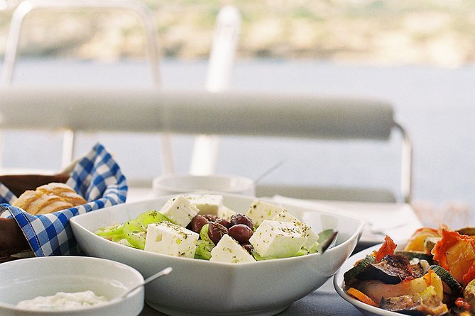 Luxury Catamaran Cruise Including pickup and Traditional Food - What the crew and driver add to the day