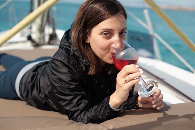 Luxury Catamaran Sunset Private & Greek Gastronomy in Athens - Vouliagmeni Beach and the Greek meal