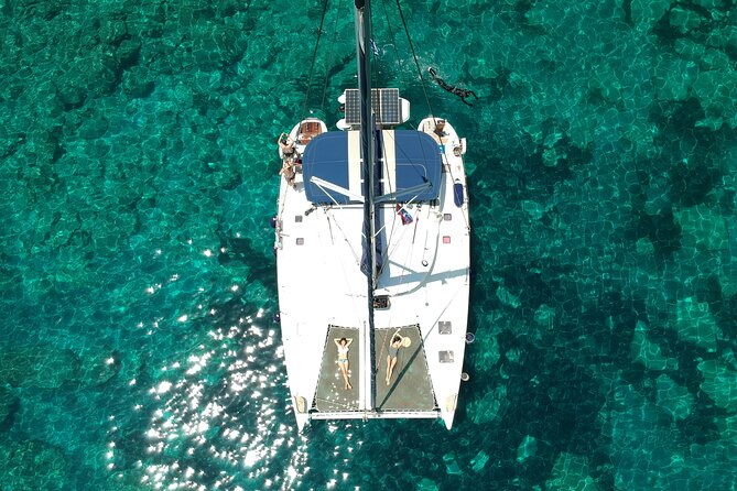 Milos caves snorkelling Catamaran Cruise in a small group - Sykia Cave: dinghy access and homemade snacks