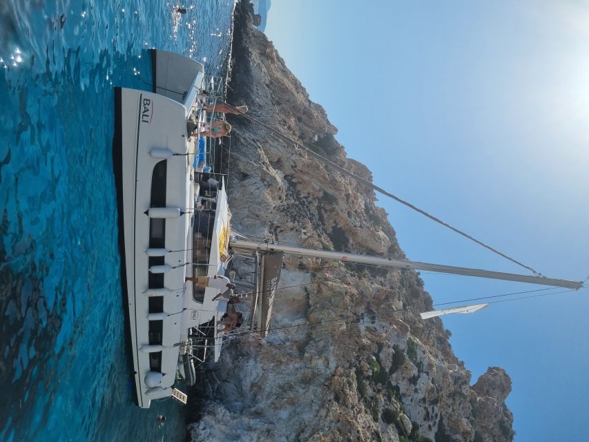 Milos: Full-Day Catamaran Cruise with Food and Open Bar - Food, drinks, and the onboard rhythm