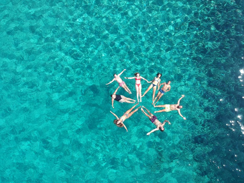 Milos: Full-Day Catamaran Cruise with Paddle Board - Sykia Cave and its natural skylight