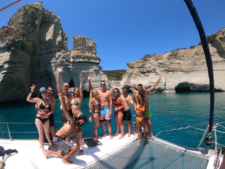 Milos: Full-Day Catamaran Cruise with Paddle Board - Leaving Adamas past Milos’ old settlements