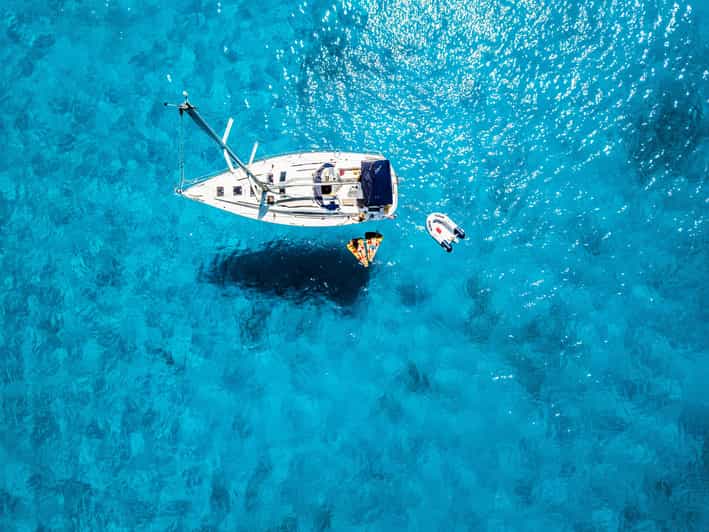 Milos: Full-Day Kleftiko Poliegos Sailboat Tour with Lunch - Lunch at Gerakas Beach