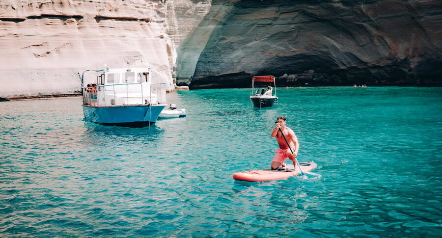 Milos: Kleftiko Morning Catamaran Cruise with Lunch & Drinks - Sailing past Klima’s colorful fishing houses