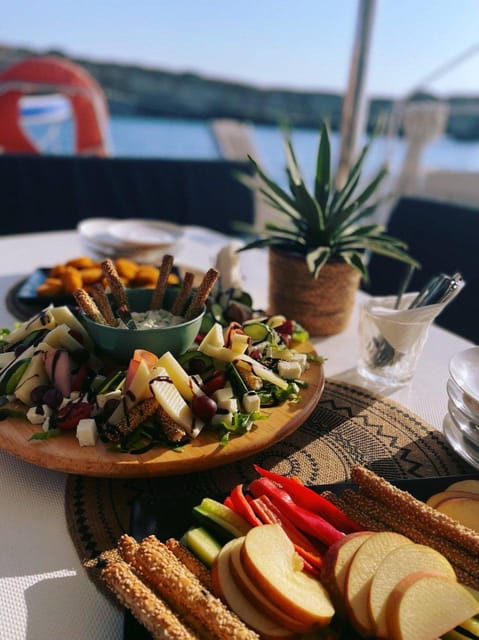 Milos: Kleftiko Morning Catamaran Cruise with Lunch & Drinks - Lunch, local flavors, and the open bar