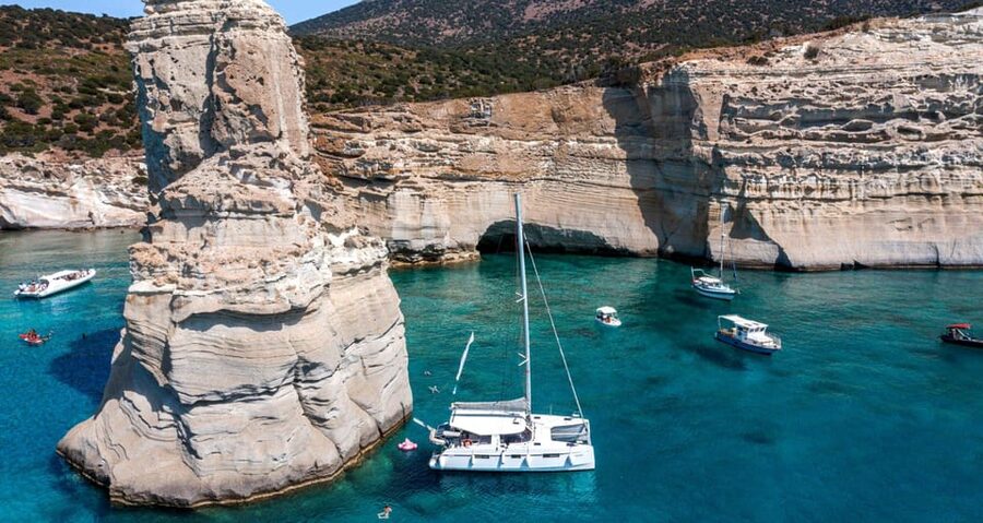 Milos: Kleftiko Sunset Catamaran Cruise with Meal & Drinks - Sailing past Klima and Cape Vani
