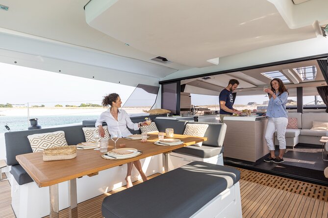 Mykonos: Brand-New Catamaran Cruise with Meal, Drinks & Transport - Lunch, wine, beer, and the real value of the price
