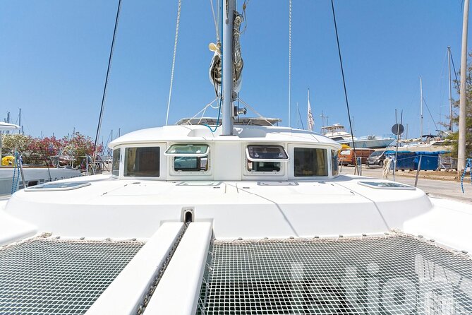 Mykonos Catamaran Cruise with Meal Drinks and Sup - Delos viewed from the catamaran