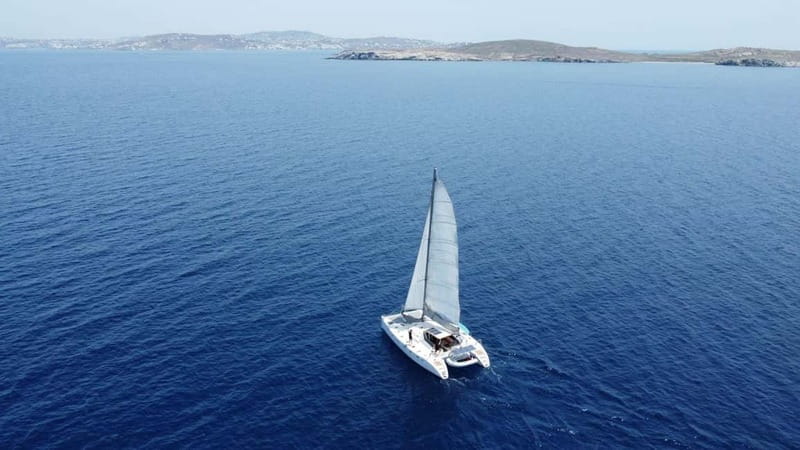 Mykonos: Catamaran Cruises with Lunch and Drinks - Swimming in clear Aegean water