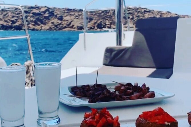 mykonos eleftheriou yachting Private tour mykonos delos renia - Boarding at Kalafatis Beach at noon