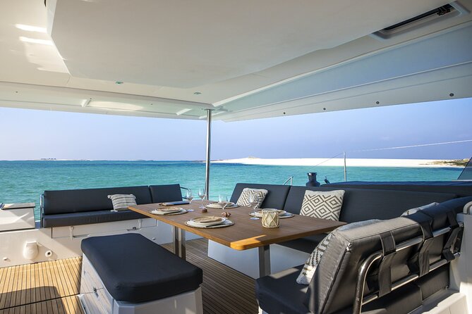 Mykonos: Luxury Catamaran Cruise with Meal, Drinks & Transport - White Coral, Aerial, and the space onboard