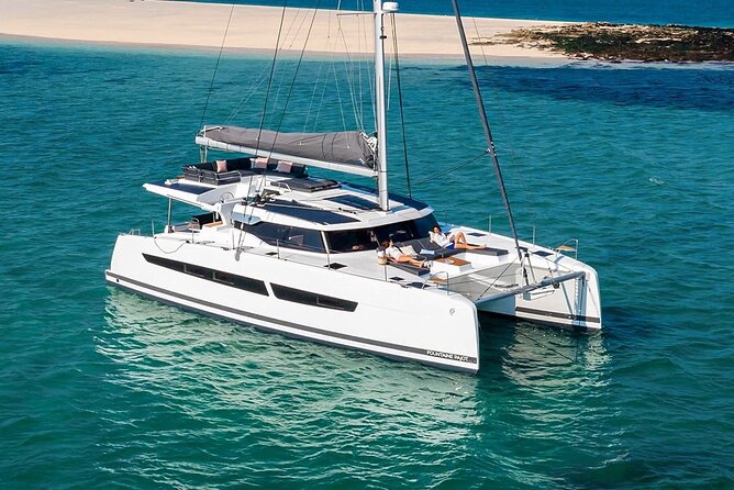Mykonos: Luxury Catamaran Cruise with Meal, Drinks & Transport - Rhenia: the main swimming and relaxation stop
