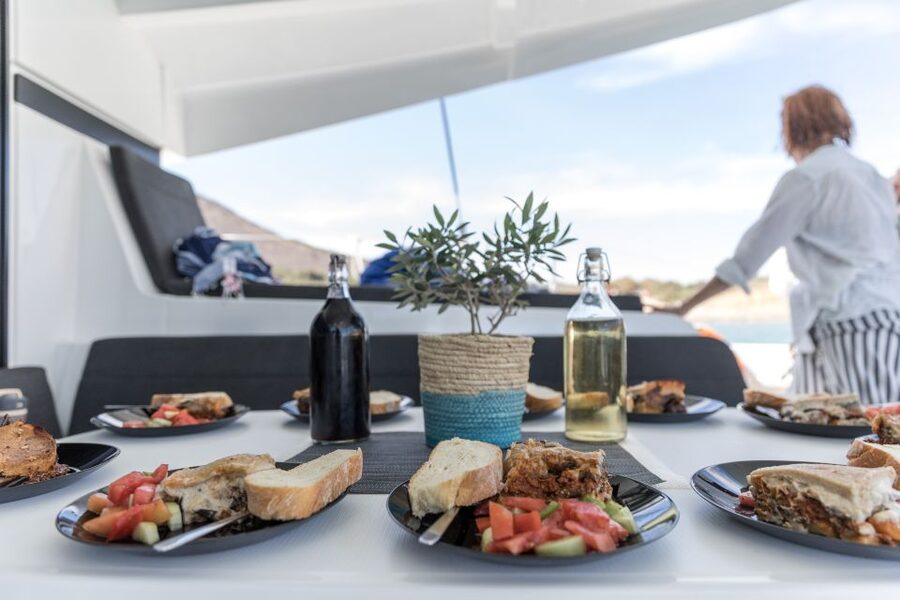 Naxos: Catamaran Cruise with Swim Stops, Food, and Drinks - Boarding one of four spacious catamarans