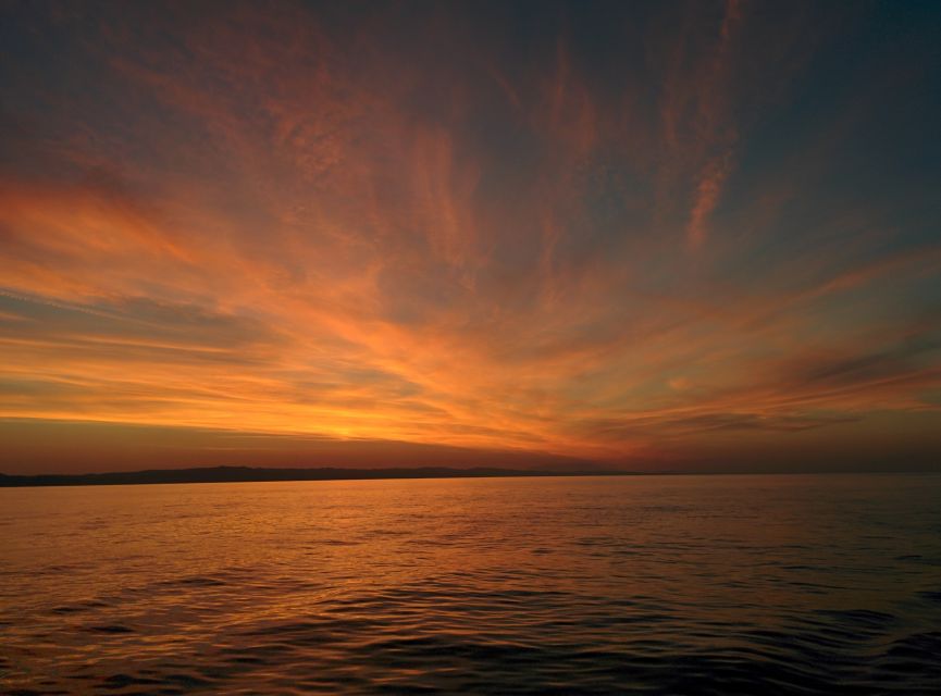 Neos Marmaras: Sunset West Sithonia Islets Sailboat Tour - Leaving Neos Marmaras port for open water