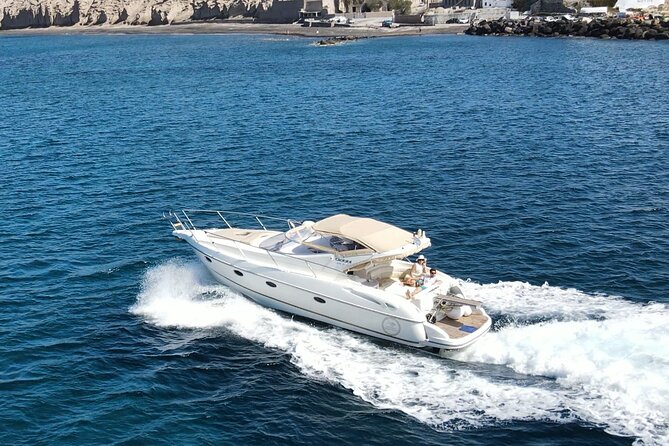 Private all included yacht Tour in Santorini - Red Beach: a quick swim beside volcanic rock