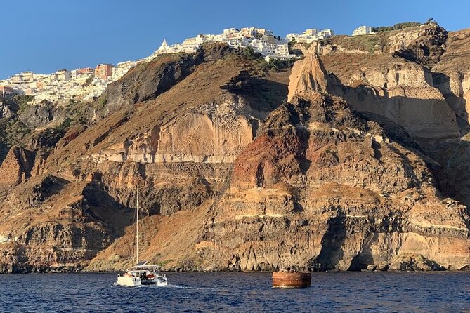 Private Luxury Santorini Catamaran Cruise with Port Pickup - Pickup from hotels, airports, and cruise ships